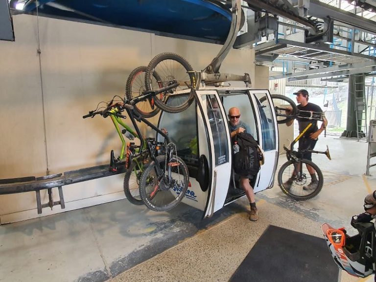 Watching the bikes go up on the gondola on the Tiki Trail in Queenstown - Copyright Freewalks NZ_800x600
