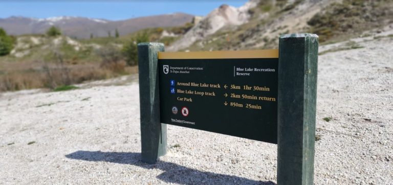 Sign showing track times around the Blue Lake