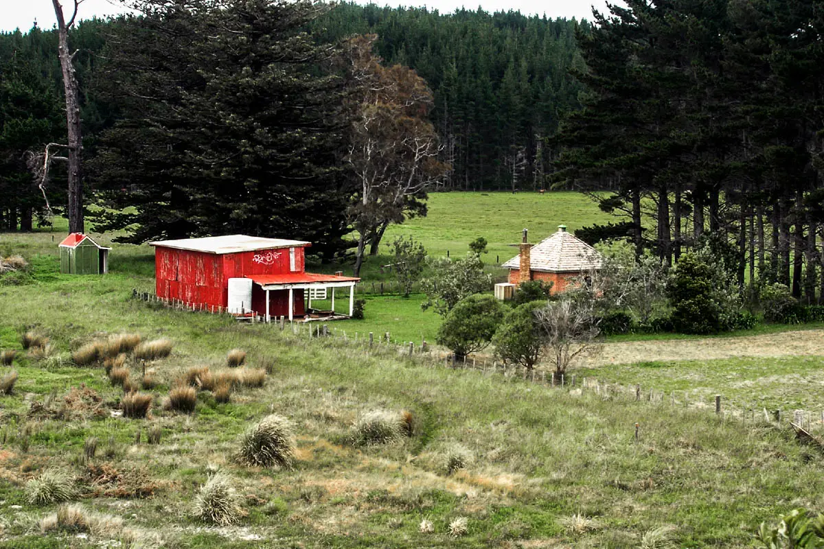 Historic Dacre Cottage and red barn at Karepiro Bay, Stillwater, Auckland