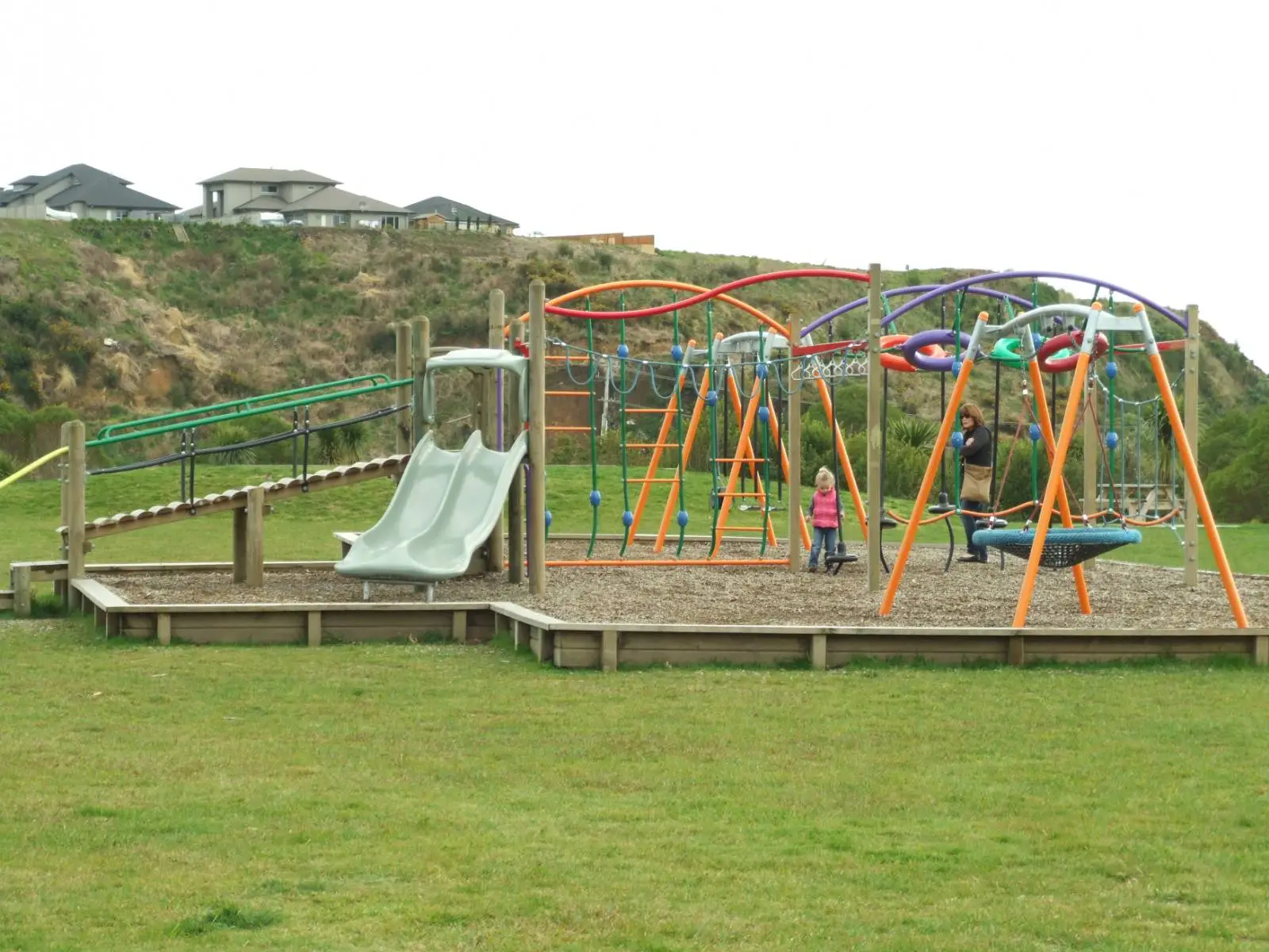 Children's playground at Gordon Carmichael Reserve, Bethlehem, Tauranga, with slides and climbing equipment