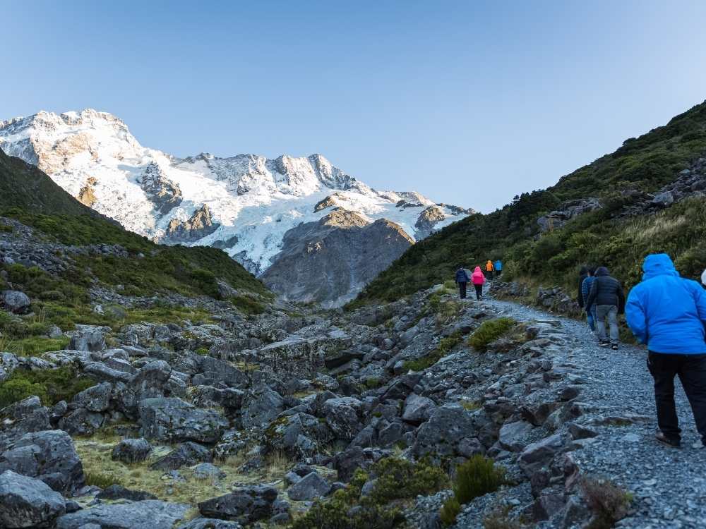 People walking along Kea Point Track at Mt Cook, New Zealand Freewalks.nz