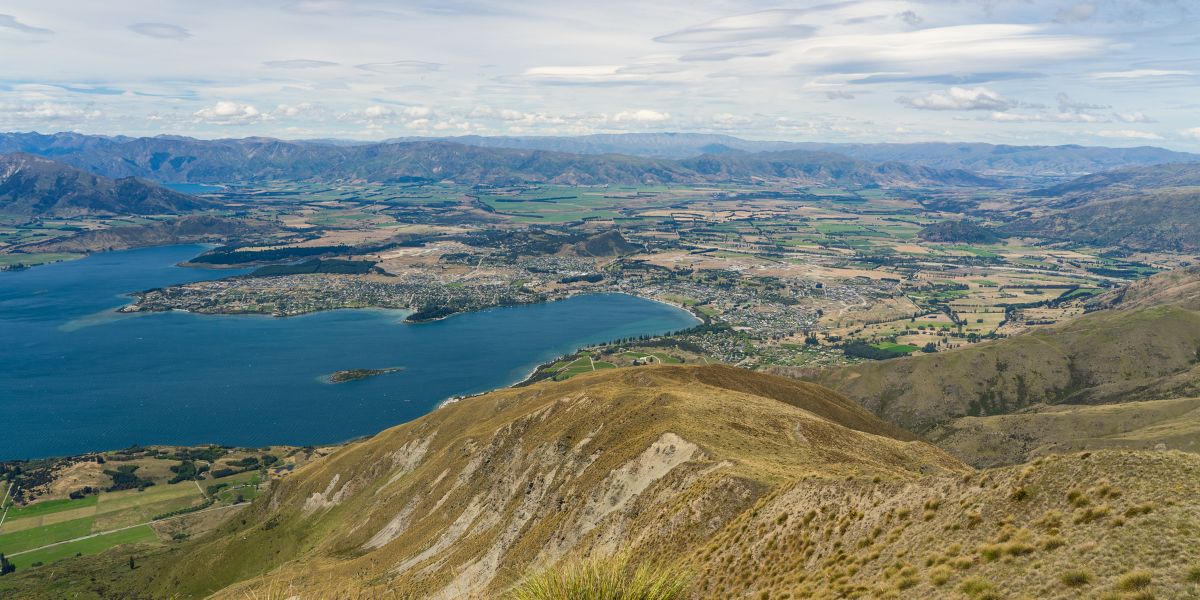 View of Wanaka town from the top of Roys Peak