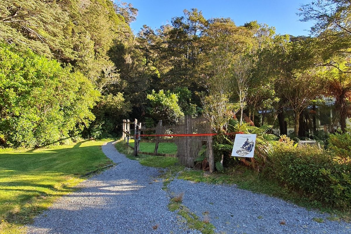 Gravel path starting point for Milford Sound Lookout Track near Donald Sutherland's grave, Fiordland