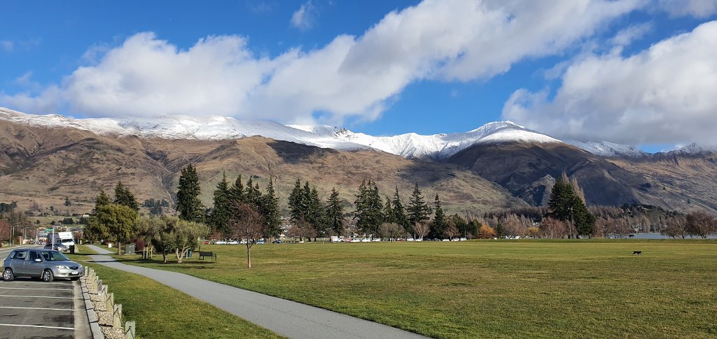 Stunning snow capped Roys Peak taken from the sports field in Wanaka town