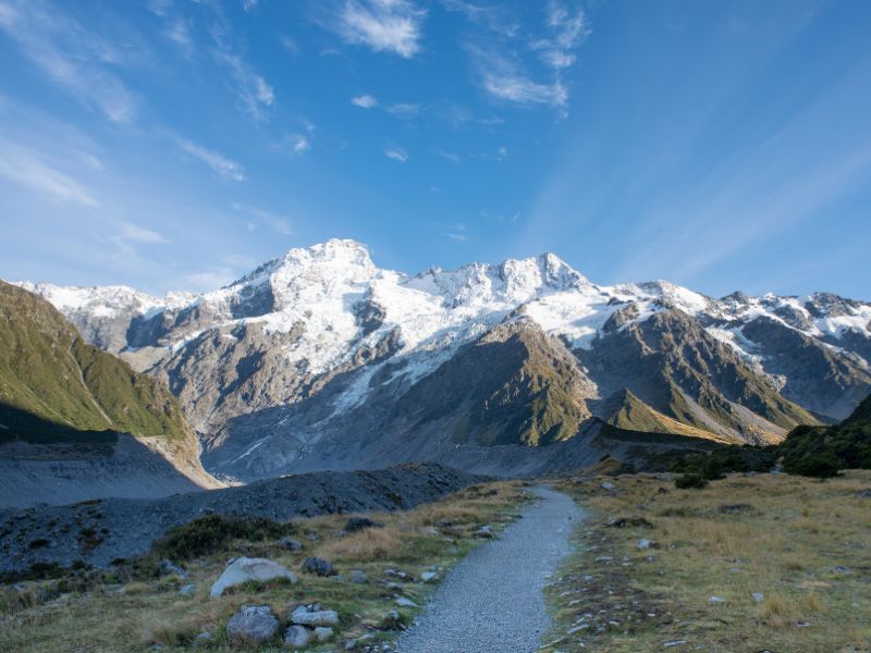 Walking along the track with views of Mount Cook snow capped mountains
