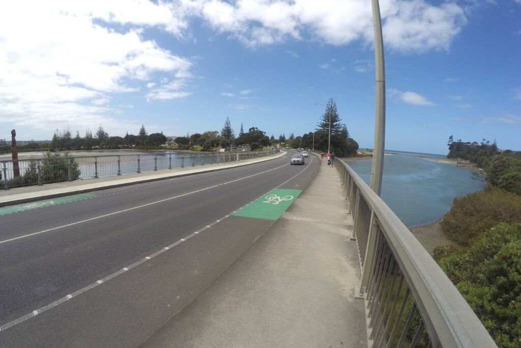 Looking back across the highway bridge at the start of the Te Ara Tahuna - Ōrewa Estuary Path just out of Auckland by Freewalks nz