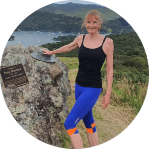 Me with my hand on the metal hat on the Glenfern Sanctury walk on Great Barrier Island