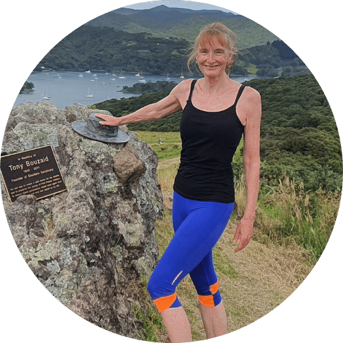 Me with my hand on the metal hat on the Glenfern Sanctury walk on Great Barrier Island