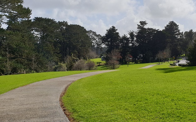 Unsworth walkway with grass, bush and activities