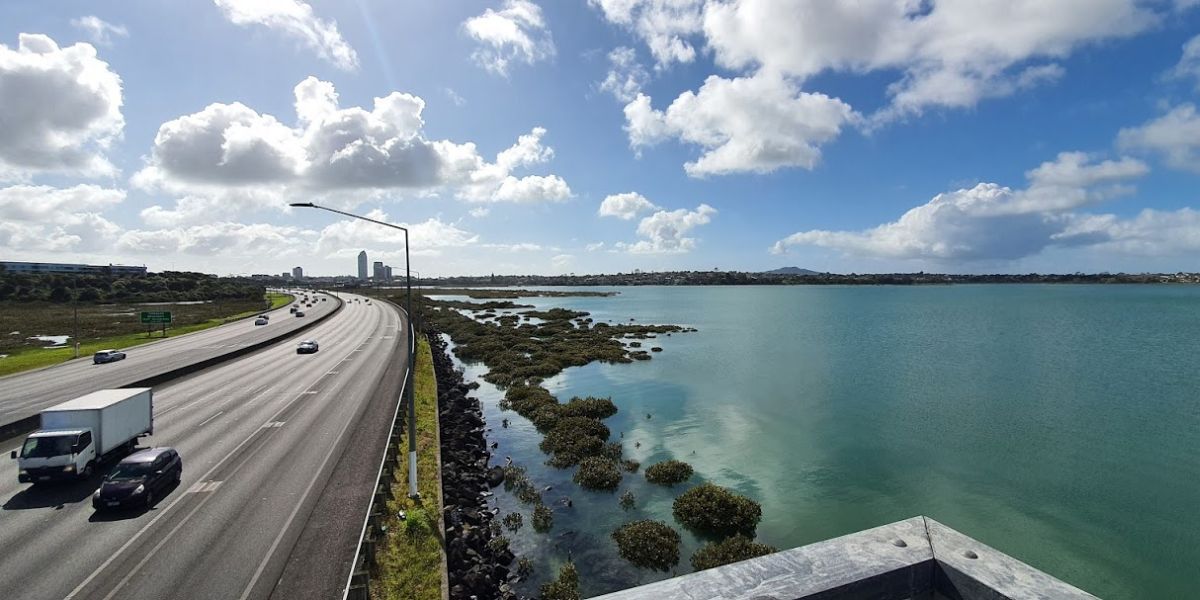 View from the walk over of the motorway and sea at Tuff Crater walk