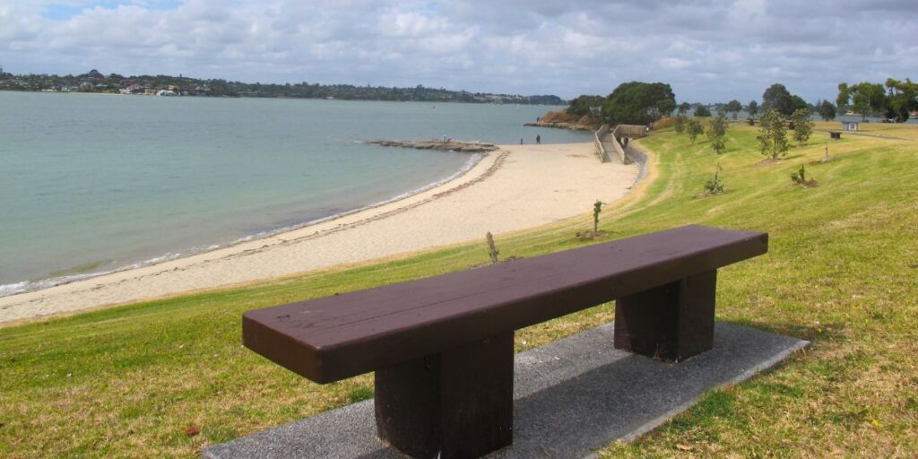 View from the bench seat at Point England Reserve of the beach near Mt Wellington