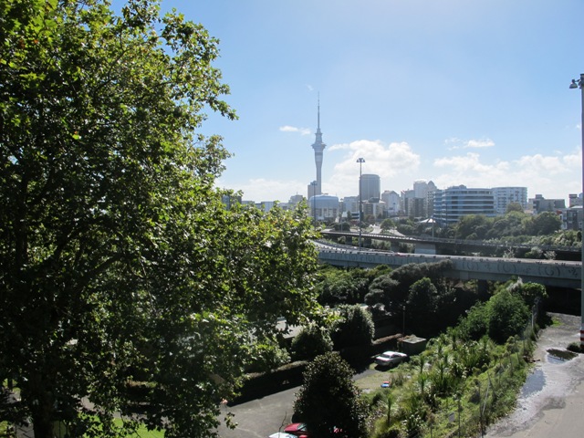 down the side roads off Karangahape Road, the Harbour Bridge and the Sky Tower.