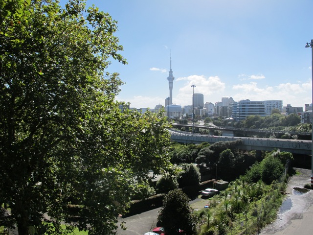 down the side roads off Karangahape Road, the Harbour Bridge and the Sky Tower.