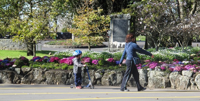 walking with children on bikes and scooters