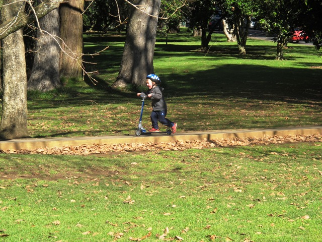 walking with children on bikes and scooters