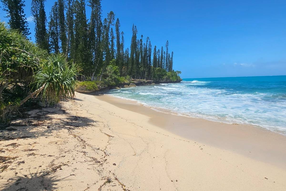 A picturesque beach white sand and a cool