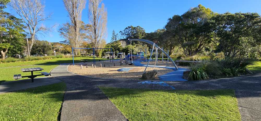 Playground in the reserve with swings and a climbing frame