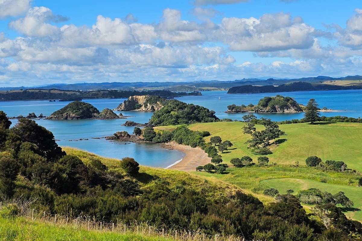 Panoramic view Bay of Islands from Marsden Cross Walk showing islands and farmland