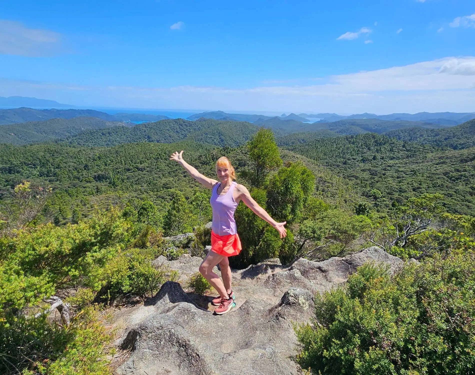Sandra at the summit of Maungapiko Lookout on Kiwiriki Track Great Barrier Island