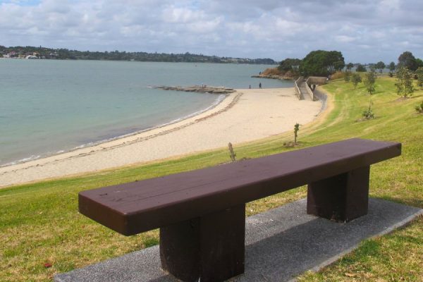 View from the bench seat at Point England Reserve of the beach near Mt Wellington